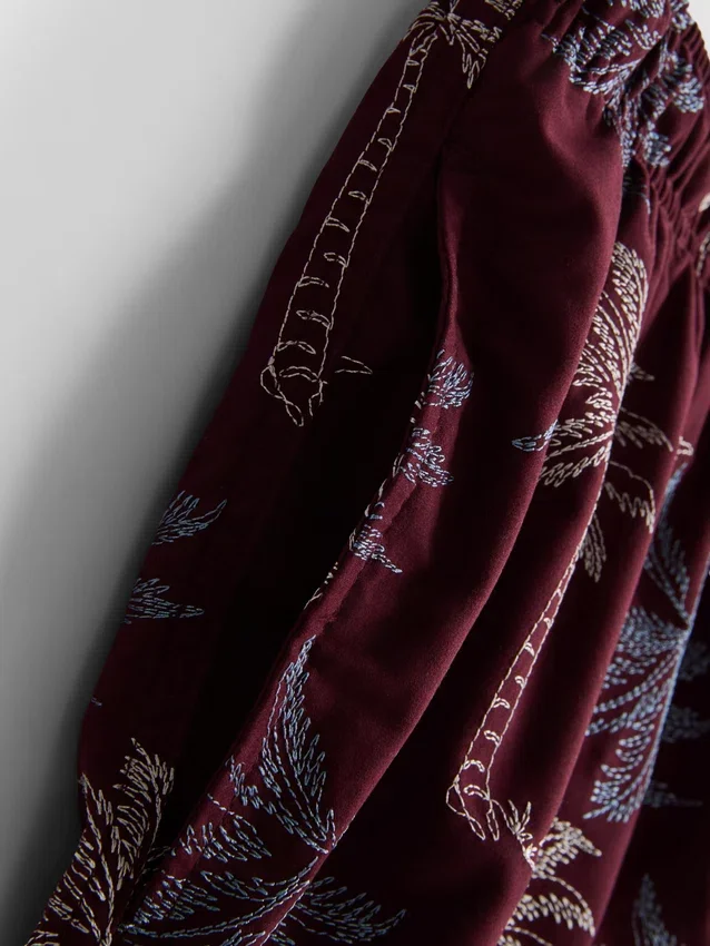 Embroidered palm tree swimming shorts
