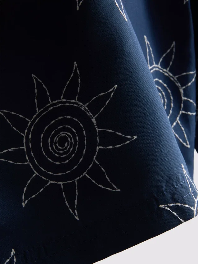 Embroidered sun swimming shorts
