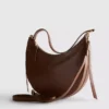 Faux suede moon shoulder bag