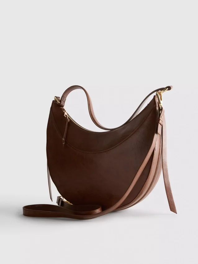 Faux suede moon shoulder bag