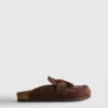 Faux suede tassel clog sandals