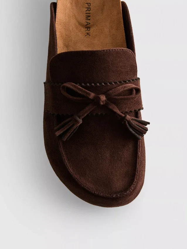 Faux suede tassel clog sandals