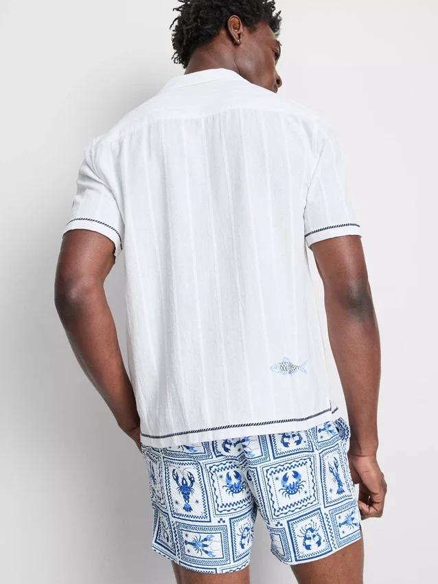 Fish embroidered revere collar shirt