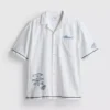Fish embroidered revere collar shirt