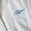 Fish embroidered revere collar shirt