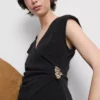 Fitted v-neck hardware top