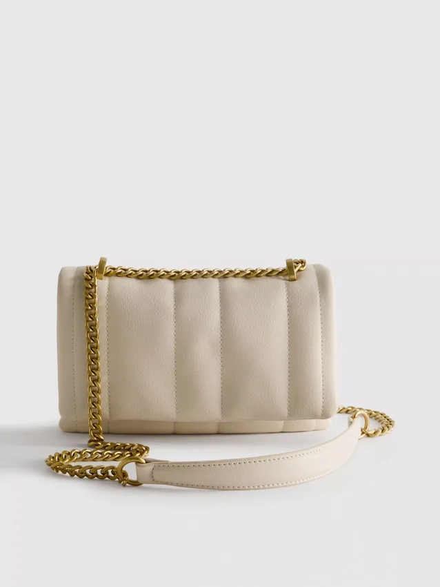 Flap-over panel crossbody bag