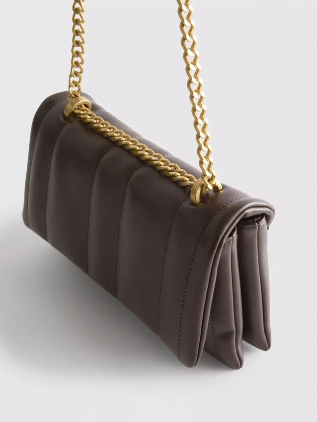 Flap-over panel crossbody bag