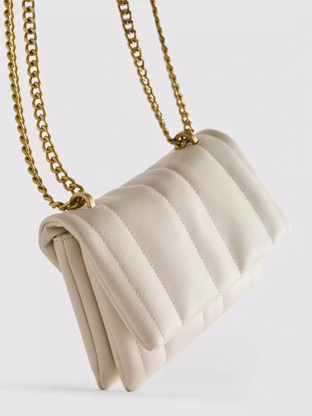 Flap-over panel crossbody bag