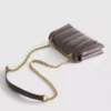 Flap-over panel crossbody bag