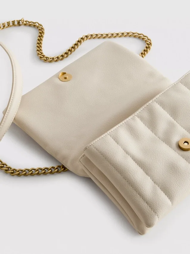 Flap-over panel crossbody bag