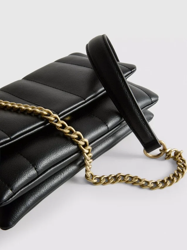 Flap-over panel crossbody bag