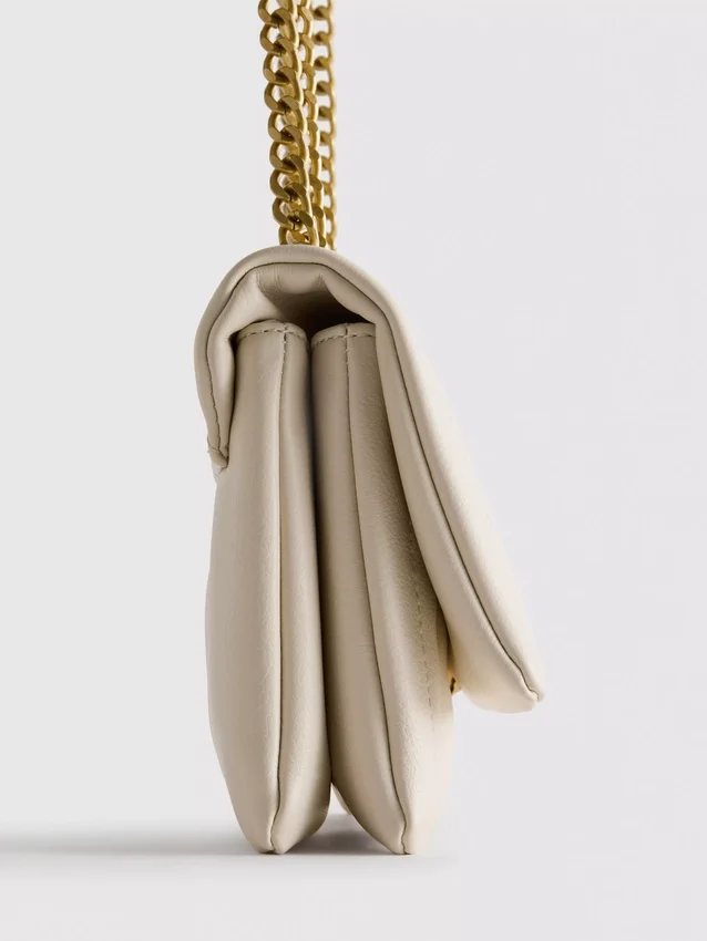 Flap-over panel crossbody bag