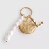 Initial shell charm keychain