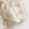 Knitted asymmetrical crochet tank