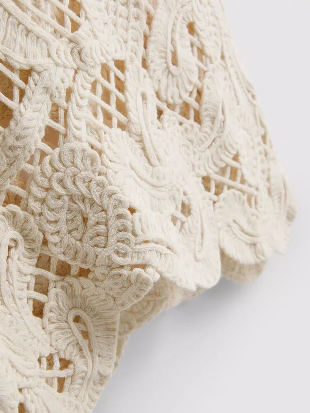 Knitted asymmetrical crochet tank