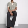 Knitted check polo shirt