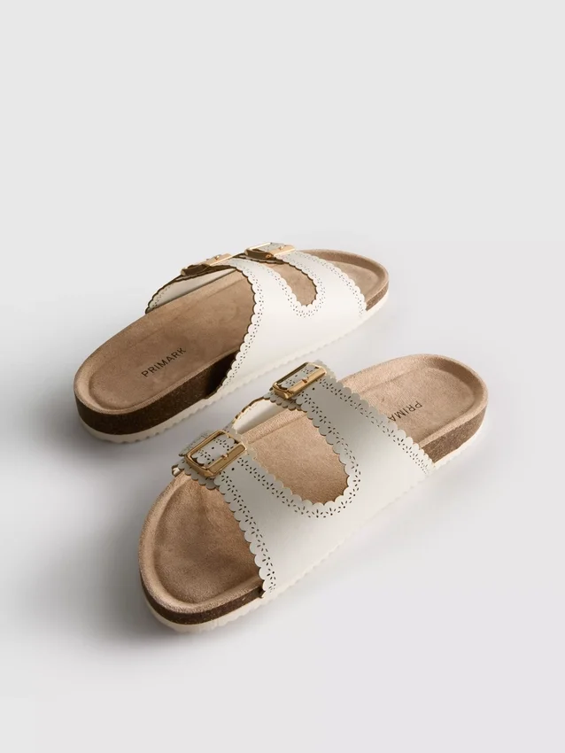 Lasercut detail footbed sandals