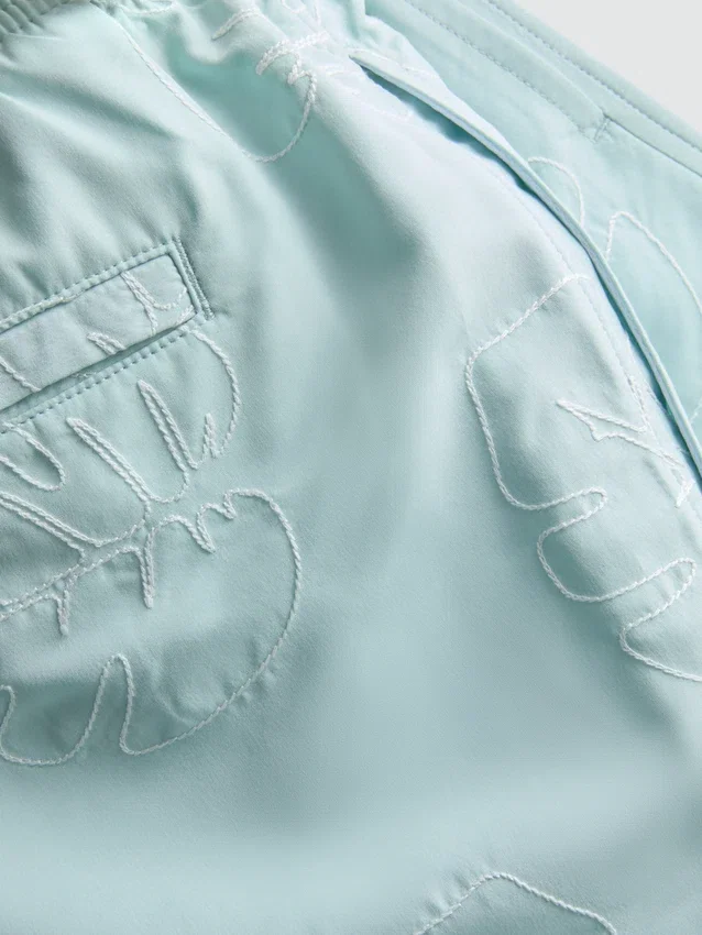 Leaf embroidered swimming shorts