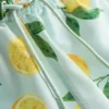 Lemon print swim shorts