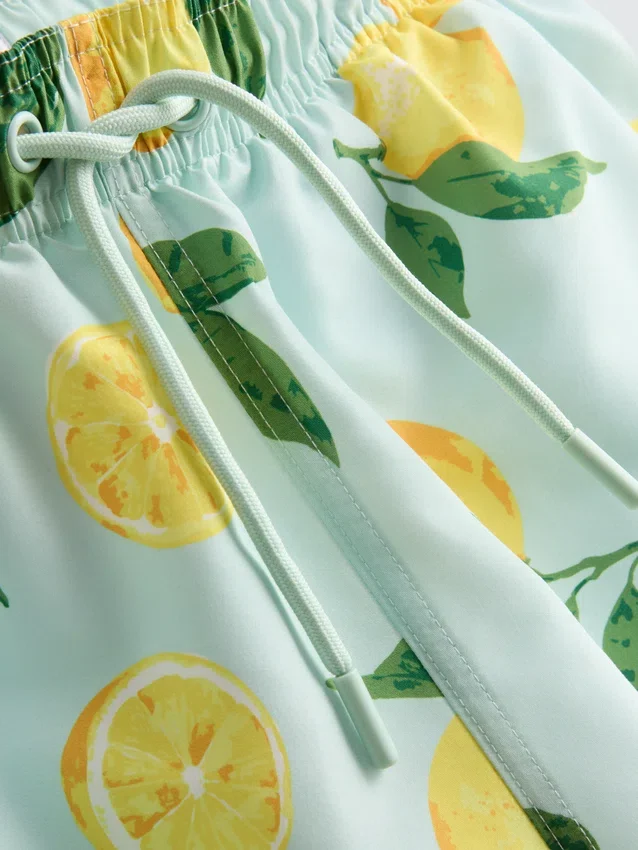 Lemon print swim shorts