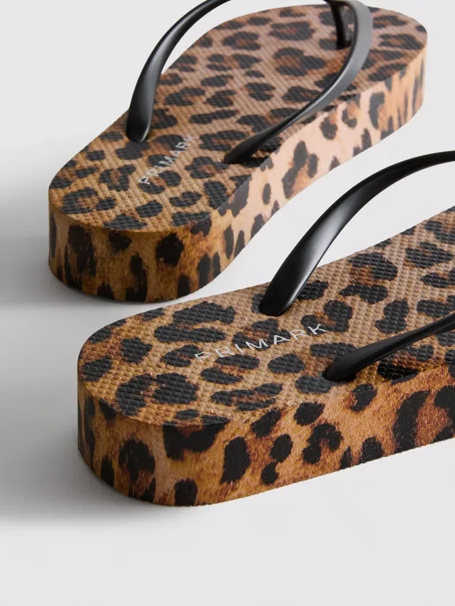 Leopard print flatform flip flops