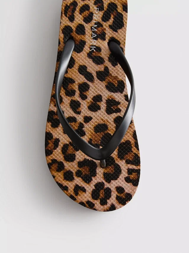 Leopard print flatform flip flops