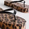 Leopard print flatform flip flops