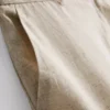 Linen-blend pleated bermuda shorts