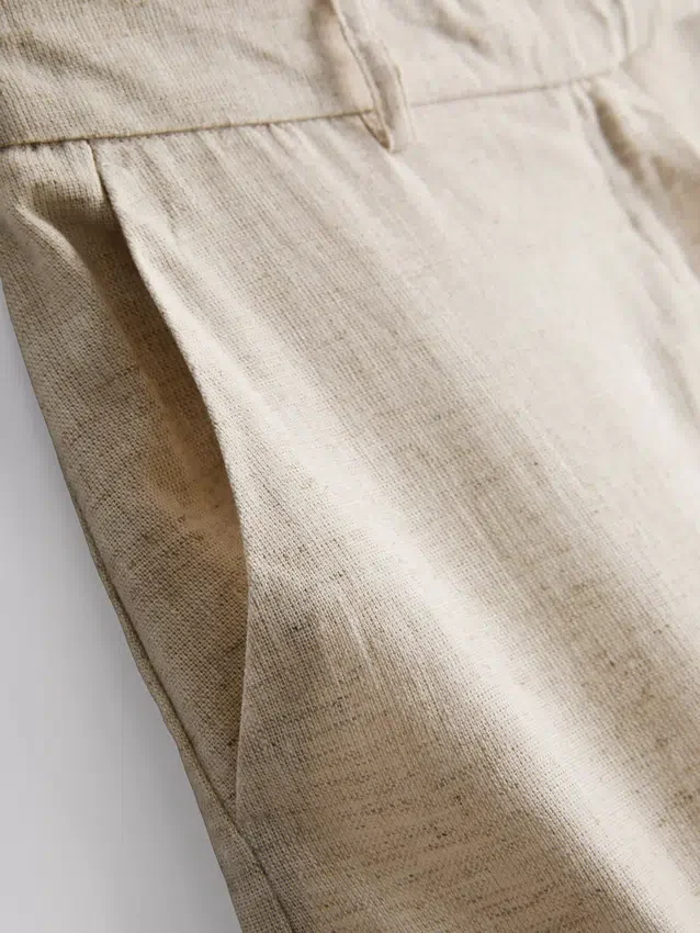 Linen-blend pleated bermuda shorts