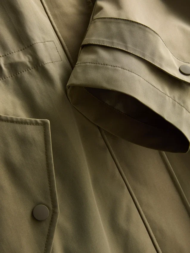 Longline cinched hooded raincoat