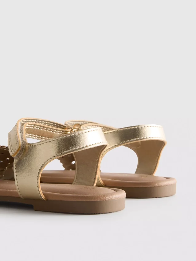 Metallic laser cut sandals