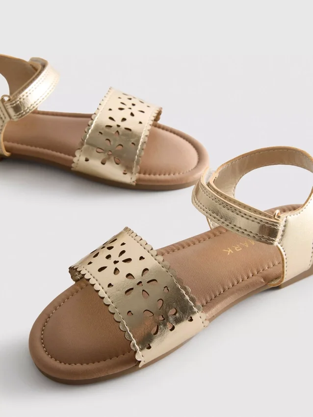 Metallic laser cut sandals
