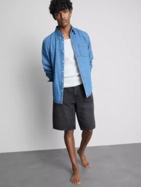 Mid-rise baggy denim shorts