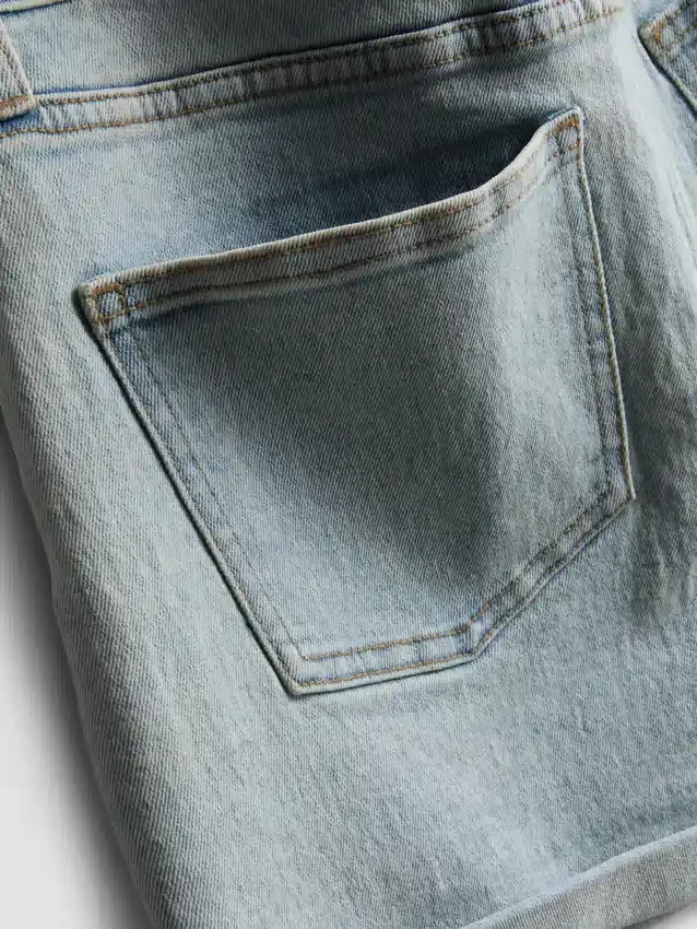 Mid-rise turn-up denim shorts