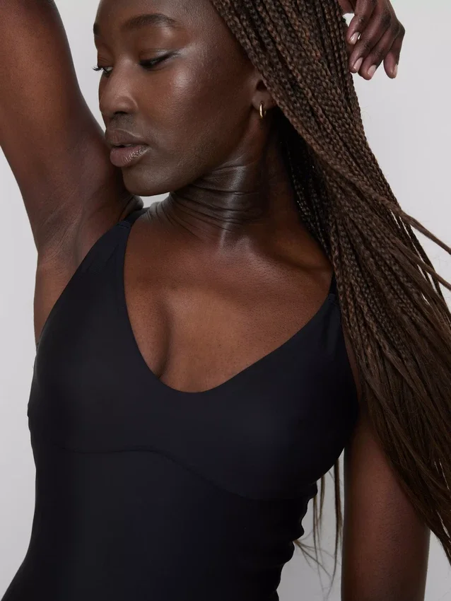 Molded shaping bodysuit