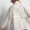 Packaway zip-up rain jacket