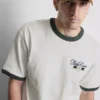 Palm courts ringer t-shirt