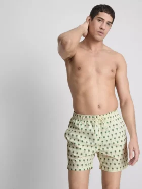 Palm tree textured swimming shorts
