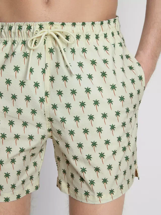 Palm tree textured swimming shorts
