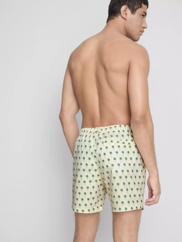 Palm tree textured swimming shorts