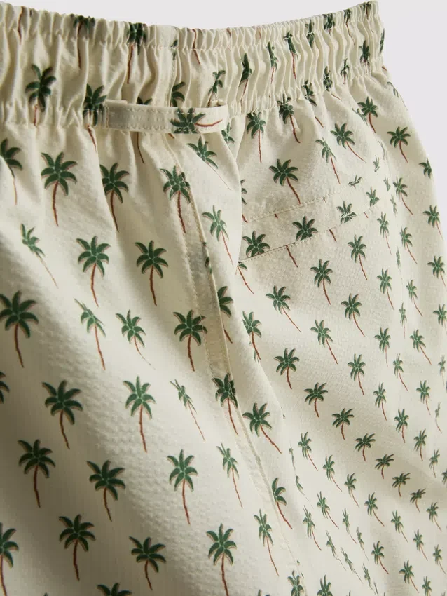 Palm tree textured swimming shorts