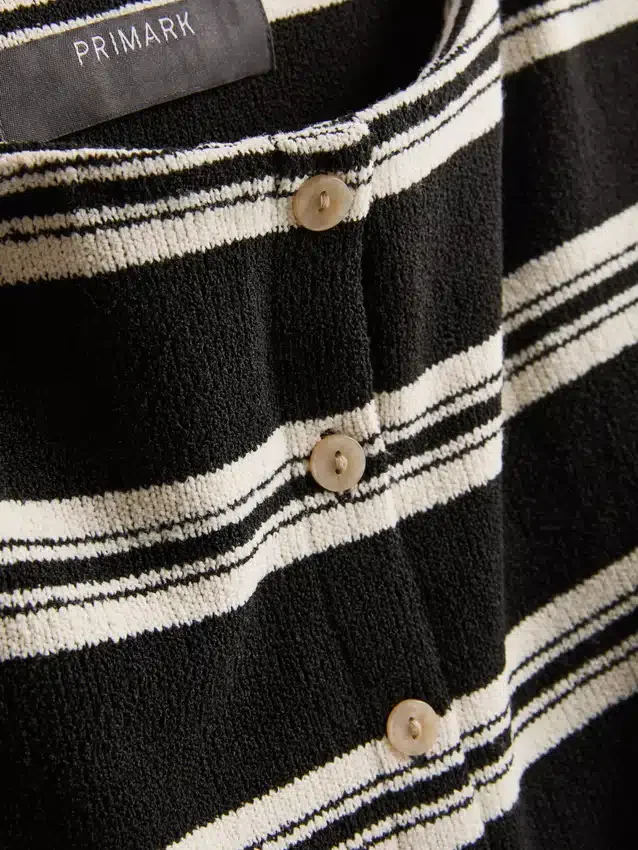 Paula echevarría knitted stripe button down top