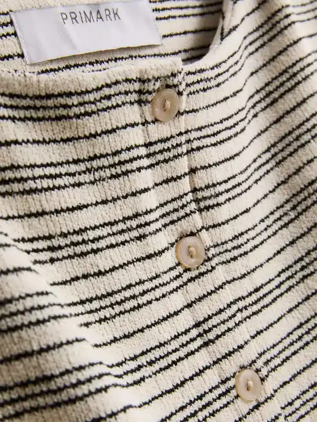 Paula echevarría knitted stripe button down top