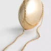 Paula echevarría metallic oval crossbody bag