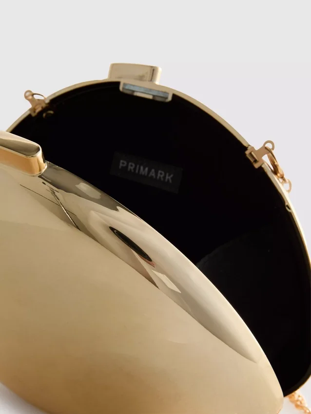 Paula echevarría metallic oval crossbody bag