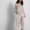 Paula echevarría paisley crushed satin button-up shirt