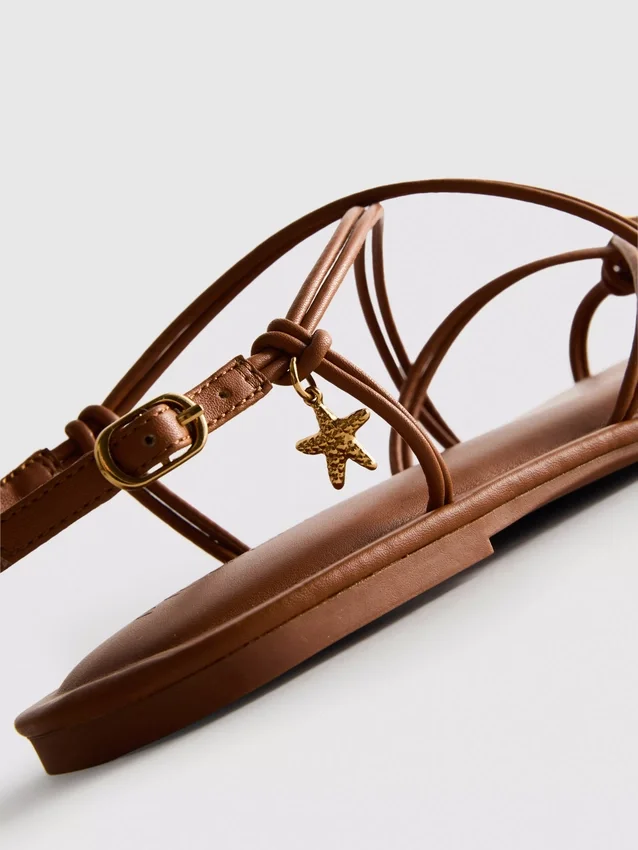 Paula echevarría strappy charm sandals