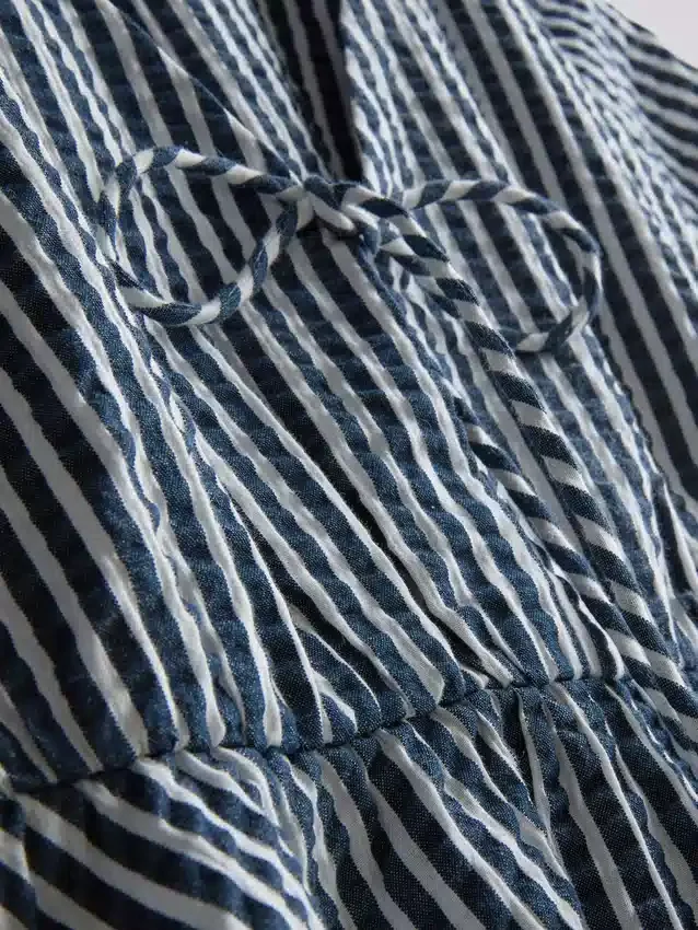 Paula echevarría striped seersucker puff-sleeve blouse