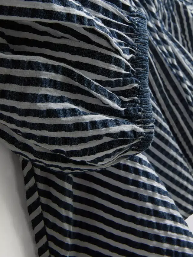 Paula echevarría striped seersucker puff-sleeve blouse